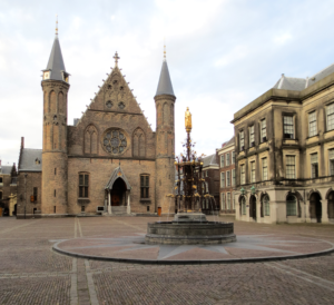 Medieval courtyard with church and foundation 